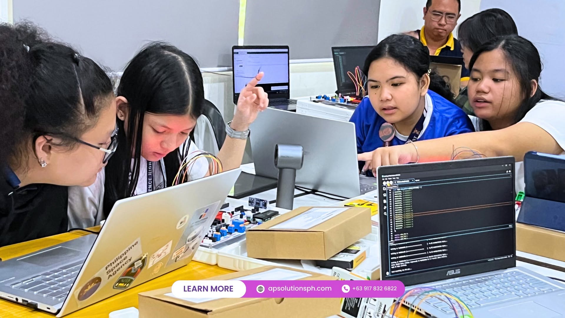 Students working through a hackathon